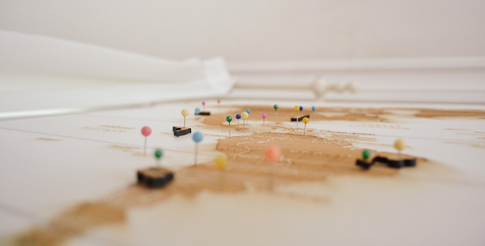 Map with colorful location pins, representing our global network